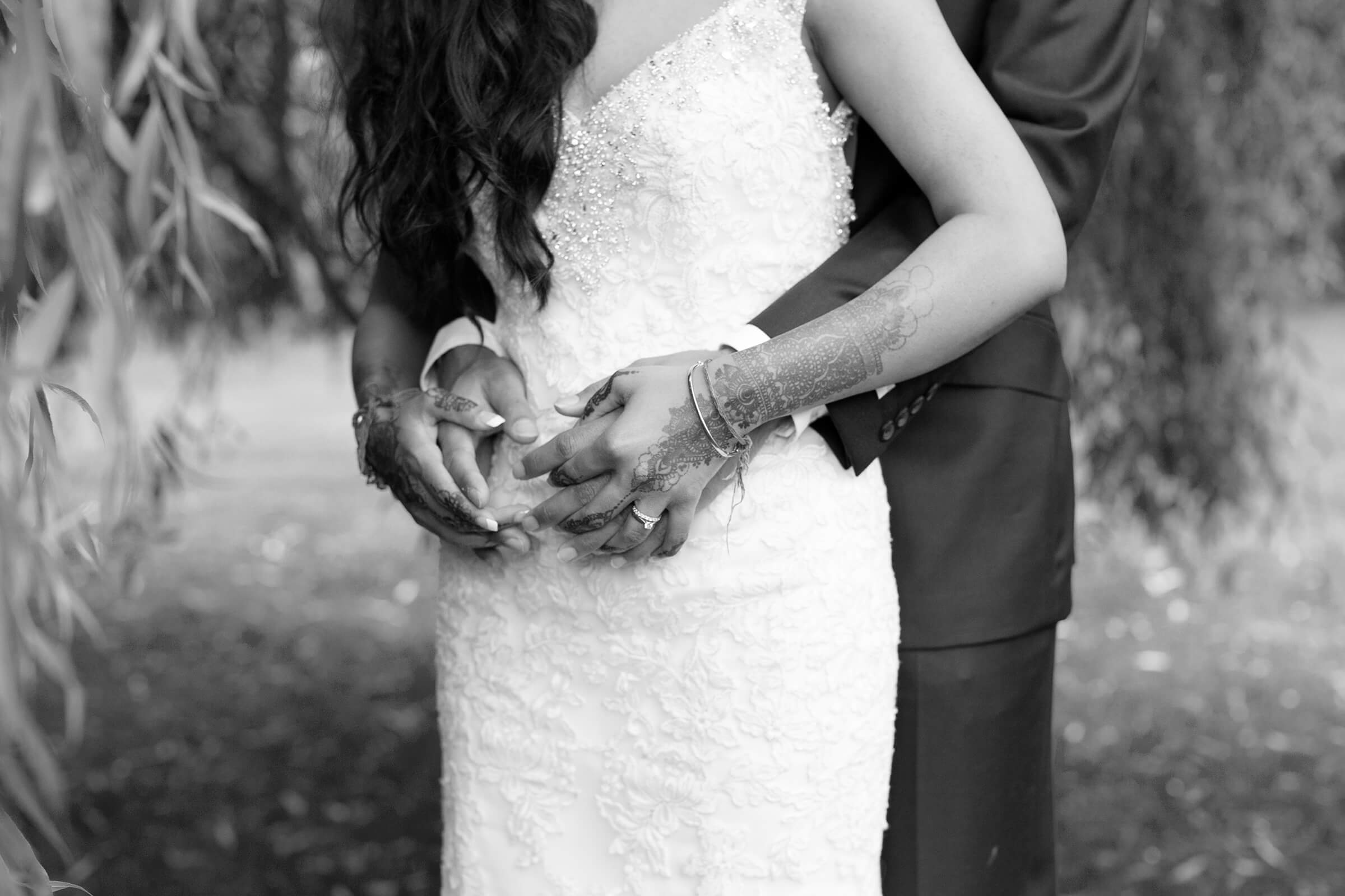 Bridge and groom close up holding hands