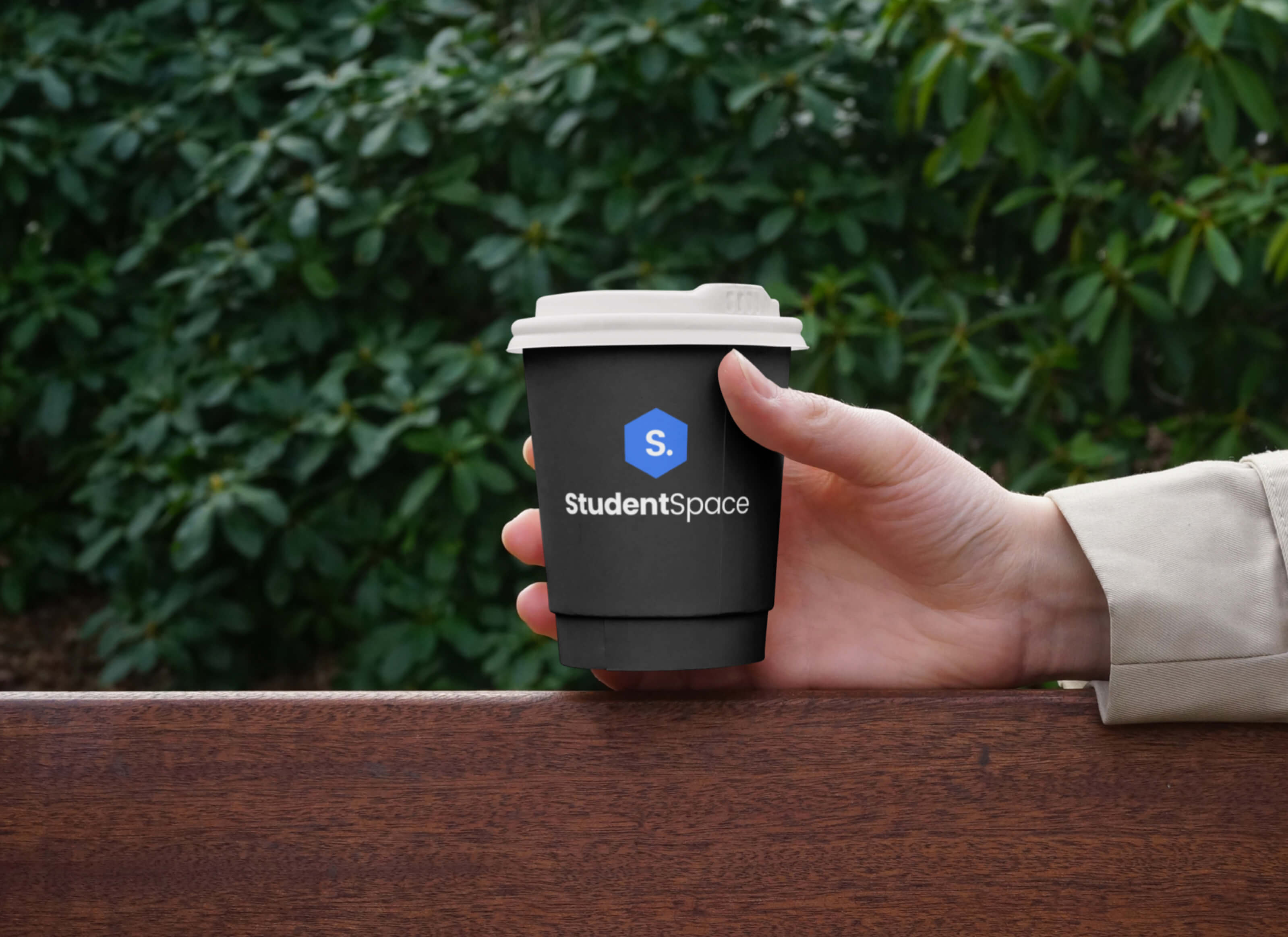 Coffee cup with Student Space branding