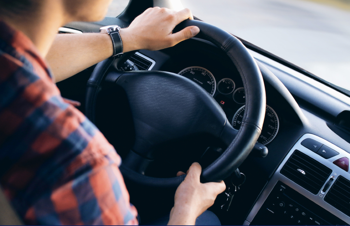 Man driving a car